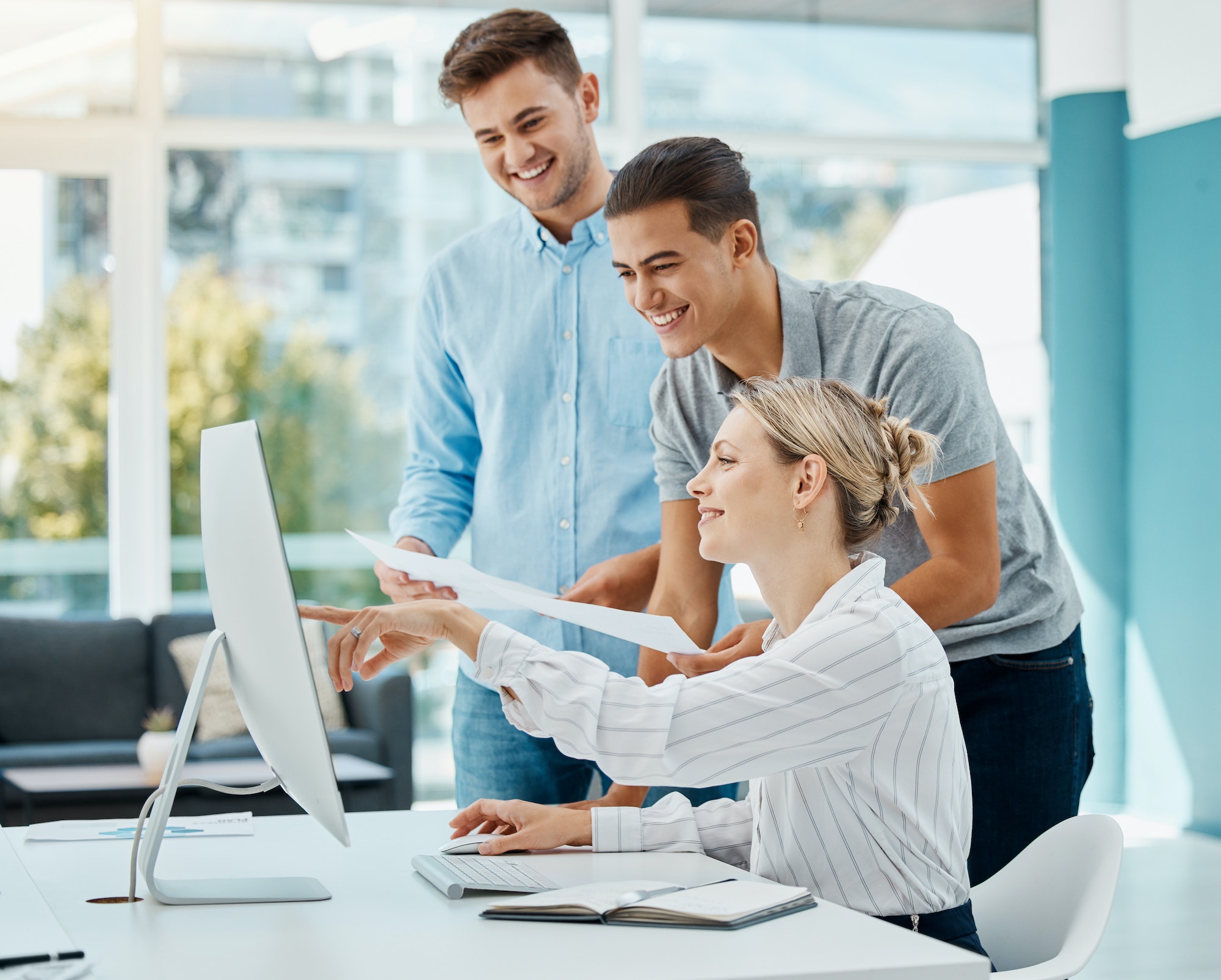 Collaboration, teamwork and creative strategy planning on a computer with marketing team in a corpo