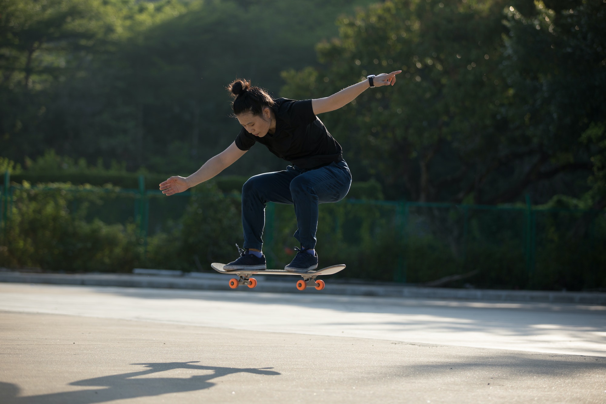 Skateboarder skateboarding at morning outdoors